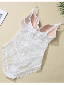 Detail of white floral lace and polka dot mesh bodysuit with adjustable straps