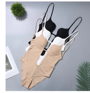 Detailed close-up of deep V-neck and low-back bodysuits in beige, white, and black colors
