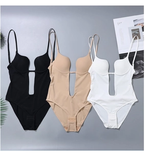Three-piece set of deep V-neck body suits in black, beige, and white with thin straps