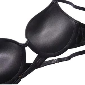 Sexy black push-up bra with cross straps and smooth fabric for a lifting effect