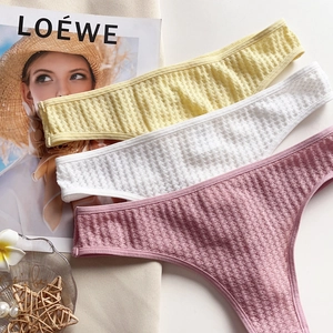 Three-pack cotton thong underwear in yellow, white and pink with waffle knit texture