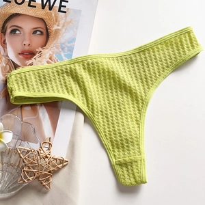 Detail of light green waffle knit thong showing textured cotton fabric and elastic edges