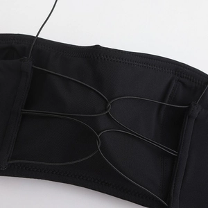 Seamless French style strapless bra in black featuring criss-cross back strap details
