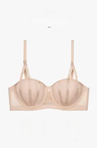 Detail of skin color lace bra featuring thin straps and light breathable fabric