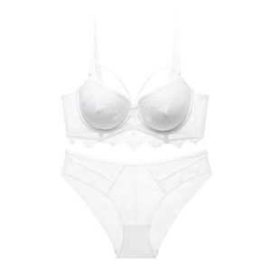 Detail of white lace lingerie set with push-up cups and criss-cross straps decoration