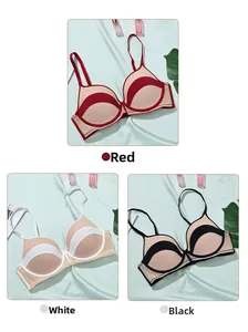 Détail de soutiens-gorge push-up sans couture en rouge, blanc et noir à bretelles