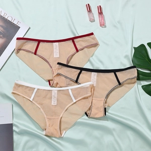 Three-pack mesh underwear set in nude with contrast stitching on elegant silk background