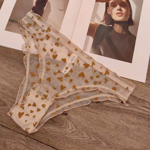 Nude pink lace heart print panties with semi-transparent mesh and scallop trim detailing