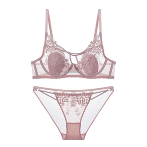 Elegant dusty pink lace lingerie set with floral embroidery and mesh details