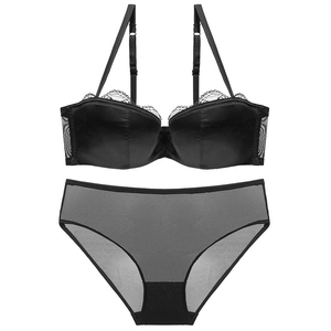 Elegant black satin and lace lingerie set with balconette bra and matching sheer mesh panties