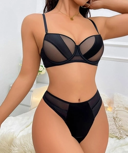 Front detail of black sheer mesh and satin lingerie set with push-up design for women