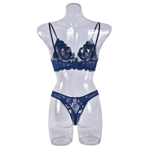 Detail view of the deep blue lace lingerie back with adjustable straps and hook-eye closure