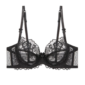 Lace bra with black floral patterns and ribbon bows for a minimalist French style look