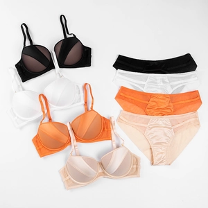 Lingerie sets in four colors featuring satin and mesh panels with push-up design