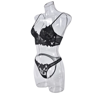 Detail of sheer black lace embroidery mesh lingerie set with floral patterns