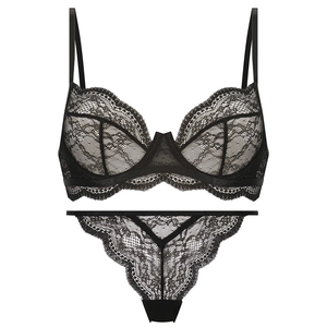 Close-up of black floral lace bra set with delicate embroidery and scalloped edges