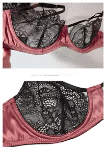 Dettaglio in raso rosa e pizzo nero con cuciture fini per intimo femminile