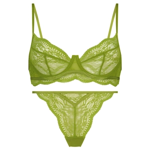 Close-up detail of grass green floral lace lingerie set with sheer mesh and underwire