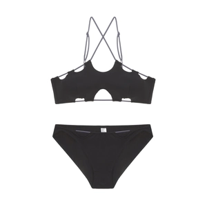 Detailed flat lay of black French-style cutout bra with grey criss-cross back straps