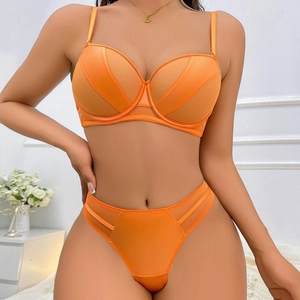 Vibrant orange push-up lingerie set with mesh panels and high-waisted cutout panties