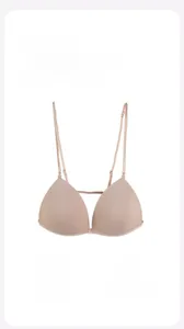 Detail view of skin-tone seamless wireless bra with thin straps and front buckle closure
