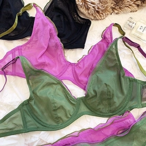 French mesh lingerie set in olive, lilac, and black with delicate wavy trim