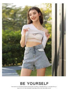 French style white lace bralette with geometric mesh worn under casual white T-shirt