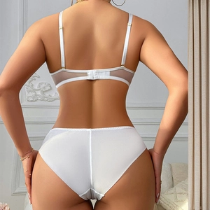 Elegant white lace lingerie set with silk-like fabric and sheer mesh back design
