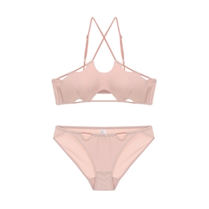 Ensemble bikini dos nu rose poudré avec dos croisé et détails ajourés sur les côtés