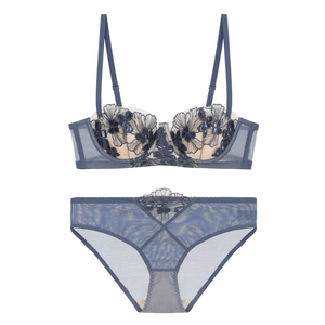 Lace embroidery lingerie set in deep blue featuring a floral bra and matching mesh panties