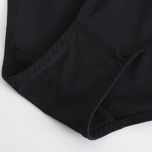 Black seamless mesh panties featuring breathable mesh and wave-edge stitching details