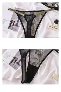 Detail of dark sheer mesh thong with floral embroidery and green adjustable straps