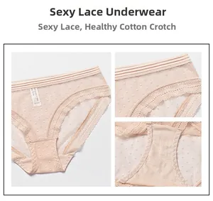 Detail of light pink lace panties featuring polka dot mesh and cotton crotch lining