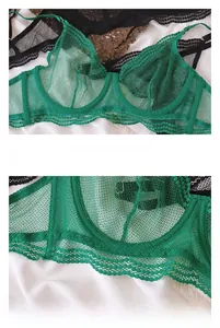 Dettaglio di bralette in pizzo verde con ferretto e bordi a conchiglia floreali