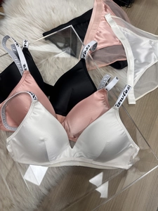Detail of satin seamless bra set with flawless letter straps and mesh lace trim