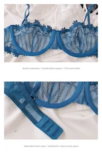 Détail du soutien-gorge en dentelle bleue avec broderie florale et agrafage ajustable