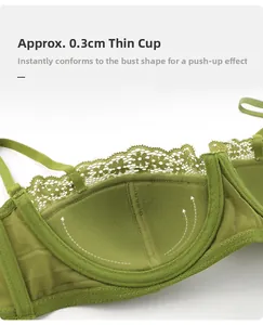 Detail view of 0.3cm ultra-thin mesh lining and green lace bra with underwire support