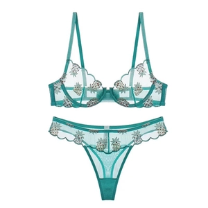 Green two-piece lace lingerie set with mesh pineapple embroidery and scalloped edges