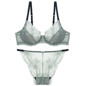Sultry floral lace lingerie set in mint green with contrasting black supportive straps