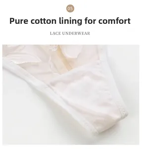 Vue détaillée du gousset en coton pur sur une culotte en dentelle blanche brodée