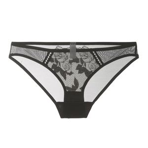 Close-up of black lace panties featuring delicate floral embroidery and sheer mesh detail