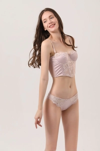 Detail of lavender satin and floral lace patchwork bra with structured corset boning