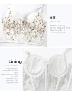 Detail of luxury white lace corset bra featuring delicate champagne floral embroidery and mesh