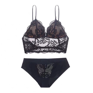 Detail view of elegant black floral lace lingerie set with wireless triangle cups