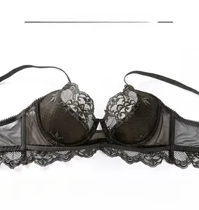 Detail of black lace bra with breathable sandwich fabric and fine floral embroidery