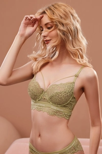Close-up of olive green lace lingerie set with Golden Dream branded elastic bands