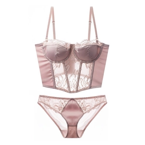 Elegant French lace lingerie set with satin trim and boned push-up corset bra in dusty pink