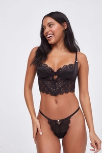 Detail view of black eyelash lace lingerie set with satin stripes and decorative buttons