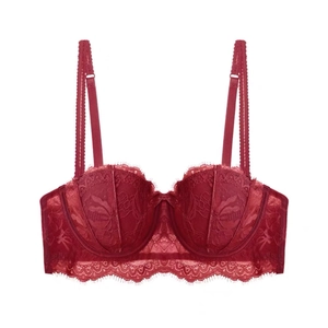 Detailed view of dark red floral lace bra featuring elegant eyelash lace and adjustable straps