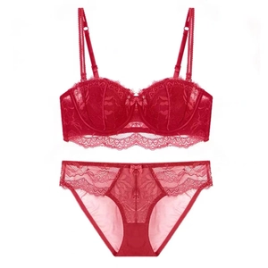 Red French lace lingerie set featuring a half-cup bra and matching panty with bow details